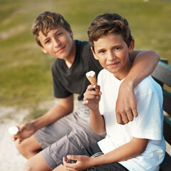 Ice cream, portrait and kid brothers on park bench hug, love and bonding on vacation together....