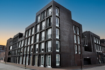 Original and modern flat block in the city of Delft, Netherlands, Europe