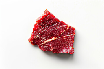 a piece of meat on a white surface