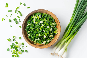 a bowl of green onions and some green onions