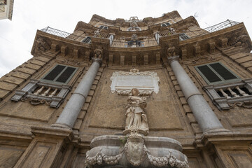 PALERMO, ITALY, 15, JUNE, 2023 - View of the Baroque facade of one of the Quattro Canti palaces in Villena square, Palermo, Sicily, Italy