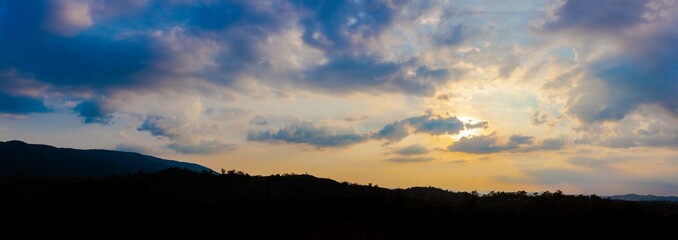 Stunning views of nature and mountains with colorful sunsets in a cloudy sky. Outdoor nature travel background. The world of beauty.
Natural panorama photography.