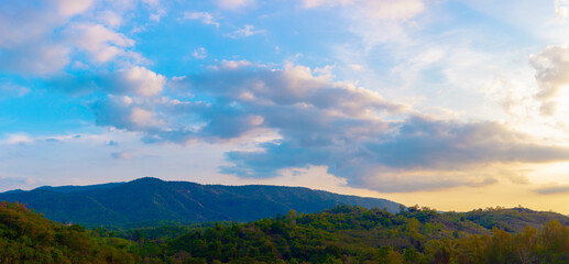 Stunning views of nature and mountains with colorful sunsets in a cloudy sky. Outdoor nature travel background. The world of beauty.
Natural panorama photography.