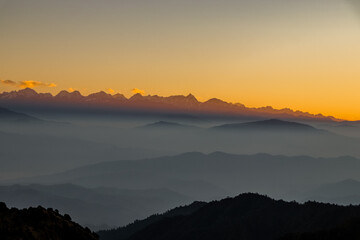 Obraz premium I take all day to climb mountains and then spend about 10 minutes at the top admiring the view, sunrise rays over the mountain .