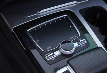 Car control touchpad Panel. Media control touchpad. Car touchpad close up. Premium car interior...