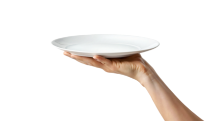 A hand carefully holds a clean white plate while another hand supports a matching empty bowl below
