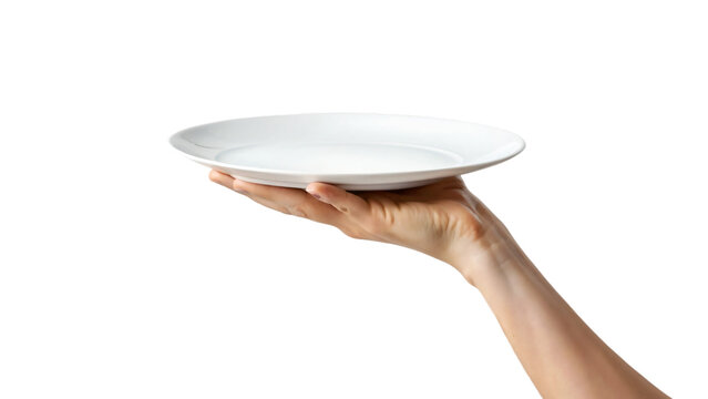 A hand carefully holds a clean white plate while another hand supports a matching empty bowl below
