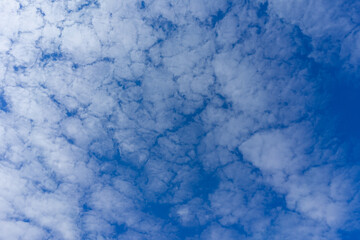 Fleecy clouds with blue sky, Texture background