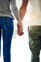 Couple, back and holding hands for love, date and walking together outdoor with trust or support....