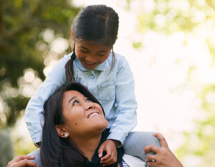 Family, mother and girl on shoulder in outdoor sunshine together with generations for embrace,...