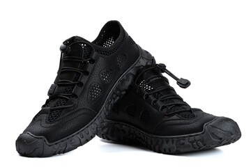 black ventilated sports shoes for men on white background