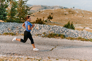 Empowered Runner Embracing Nature's Beauty on a Serene Morning Trail.