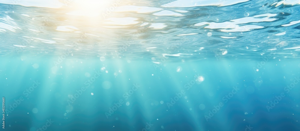 Poster the smooth natural blue water background with bokeh abstract on the sea or ocean vintage and soft co
