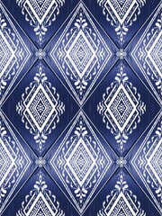 Ikat ethnic geometric oriental traditional on navy background seamless pattern. Native Aztec style...