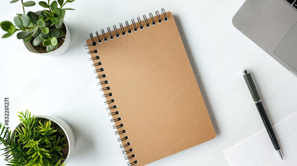 Aufkleber a notepad with a modern design resting on a white background, leaving room for text in the surroundi