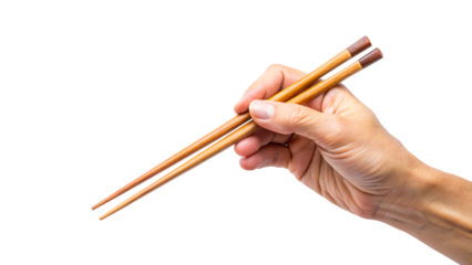A hand holding wooden chopsticks isolated on white background, a traditional utensil for eating Asian cuisine like sushi