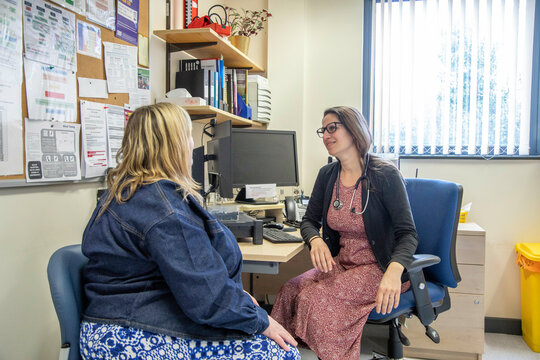 Doctor consulting with a patient in medical practice