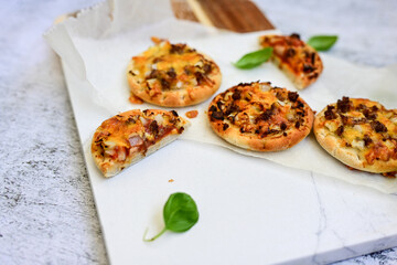 Mini american burger pizza with  onion .American finger food 