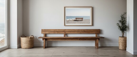 Contemporary interior design with a framed beach photograph, wood bench, and decorative plants