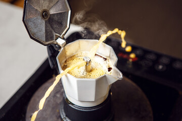 Spilling of Fresh Espresso With Italian Moka Pot on Stove