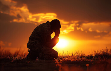 Man Kneeling in Prayer at Sunset in Field, Spiritual Redemption and Hopeful Meditation Concept
