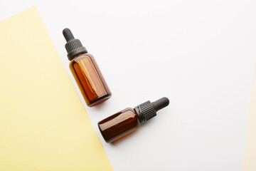 Vials, bottles mockups without labels with pipettes.
