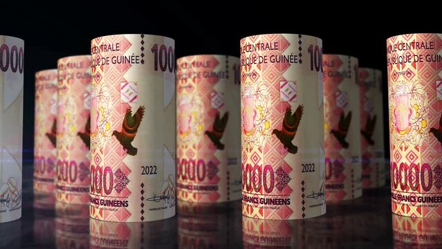 Guinea money Guinean francs rolls loop 3d. Camera moving in front of GNF 10000 rolling banknotes. Seamless loopable concept of economy, finance, business and debt.