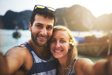 Portrait, couple and selfie with happy on beach for memory, date or holiday in relationship as...