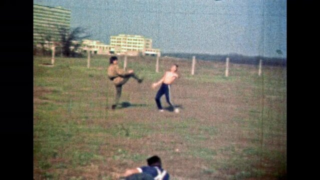Asian combat between karate masters. Professional fighting arts. Men flying, jumping use fight exercise in sport training. Japan defense. martial protection. Vintage color film. Retro 1980s archive