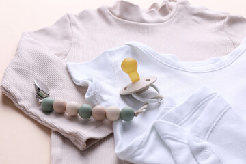 Set of bodysuit and pacifier with clip