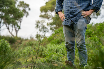 farmer holding soil looking at soil carbon in the america