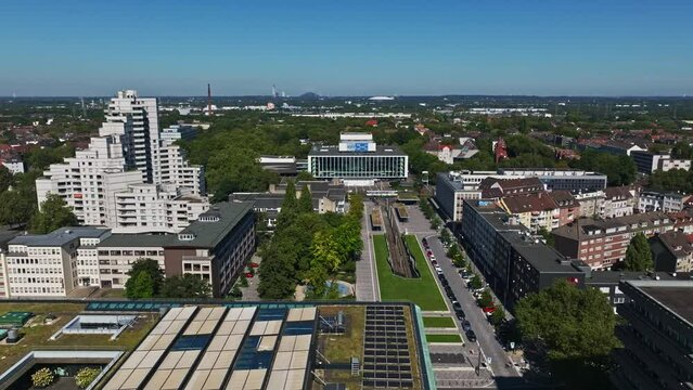 Aerial drone view of Musiktheater im Revier (Music Theatre in the Ruhr) in Gelsenkirchen, Germany. Glass-walled performing-arts space with a dramatic .