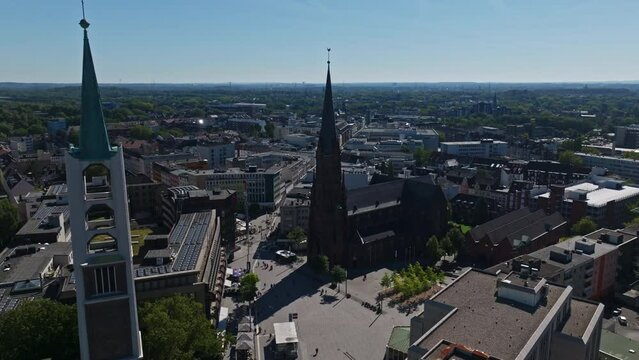 Aerial drone view of The Provost Church of St. Augustine in Heinrich K&ouml;nig Platz , Gelsenkirchen , Germany . 