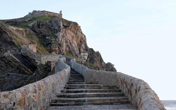 View over the stairs at San Juan de Gaztelugatxe in Spain during sunrise