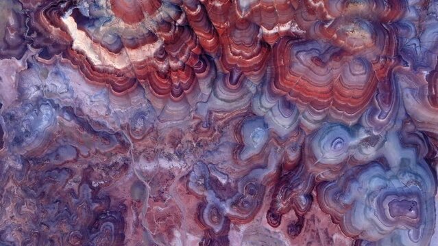 Aerial Top Upward Shot Of Multi Colored Pattern Of Hills In Famous State Park - Moab, Utah