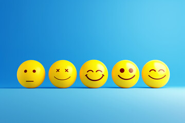 Yellow smiley faces with diverse expressions against a blue background in a line