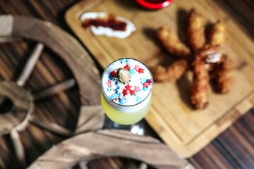 Close up of a Glass of Refreshing Drink on a Wooden Table