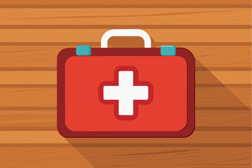 Obraz premium red first aid kit with a white cross on the front side. This image can be related to themes of health, emergency preparedness, medical supplies or safety procedures.