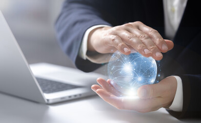 Businessman holding a virtual glowing connection sphere with network dots