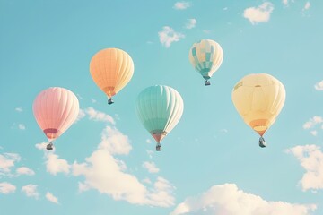 Fototapeta premium Pastel Colored Hot Air Balloons Drifting Peacefully in the Serene Sky