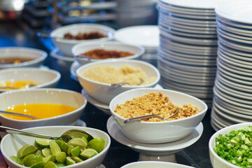 People hand grab delicious asian food in hotel seminar room