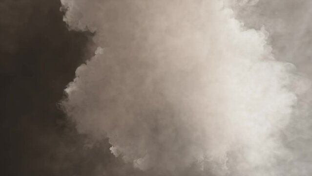 The smoke in the center of the frame flies at the viewer.