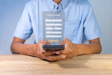 A man holding a smartphone to book a flight ticket. Online ticket booking concept.