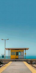 Fototapeta premium A bright yellow bus stop stands gracefully beside a road, offering shelter and a pop of color in the urban landscape