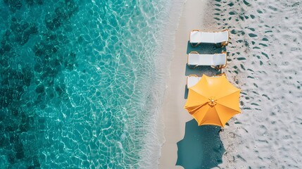 Top view of beach chairs and umbrella for summer vacation concept.