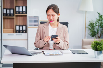 Asian businesswoman specializing in stock market and financial services, including roles as a loan...