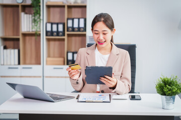 Asian businesswoman specializing in stock market and financial services, including roles as a loan...