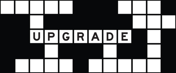 Alphabet letter in word upgrade on crossword puzzle background