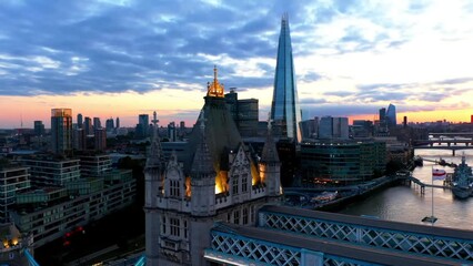 Establishing Aerial View Shot of London City Skyline with the Tower Bridge and Thames River, United Kingdom, UK