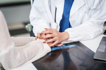 Asian female doctor specializing in psychiatry online consultations from desk, psychotherapy,...